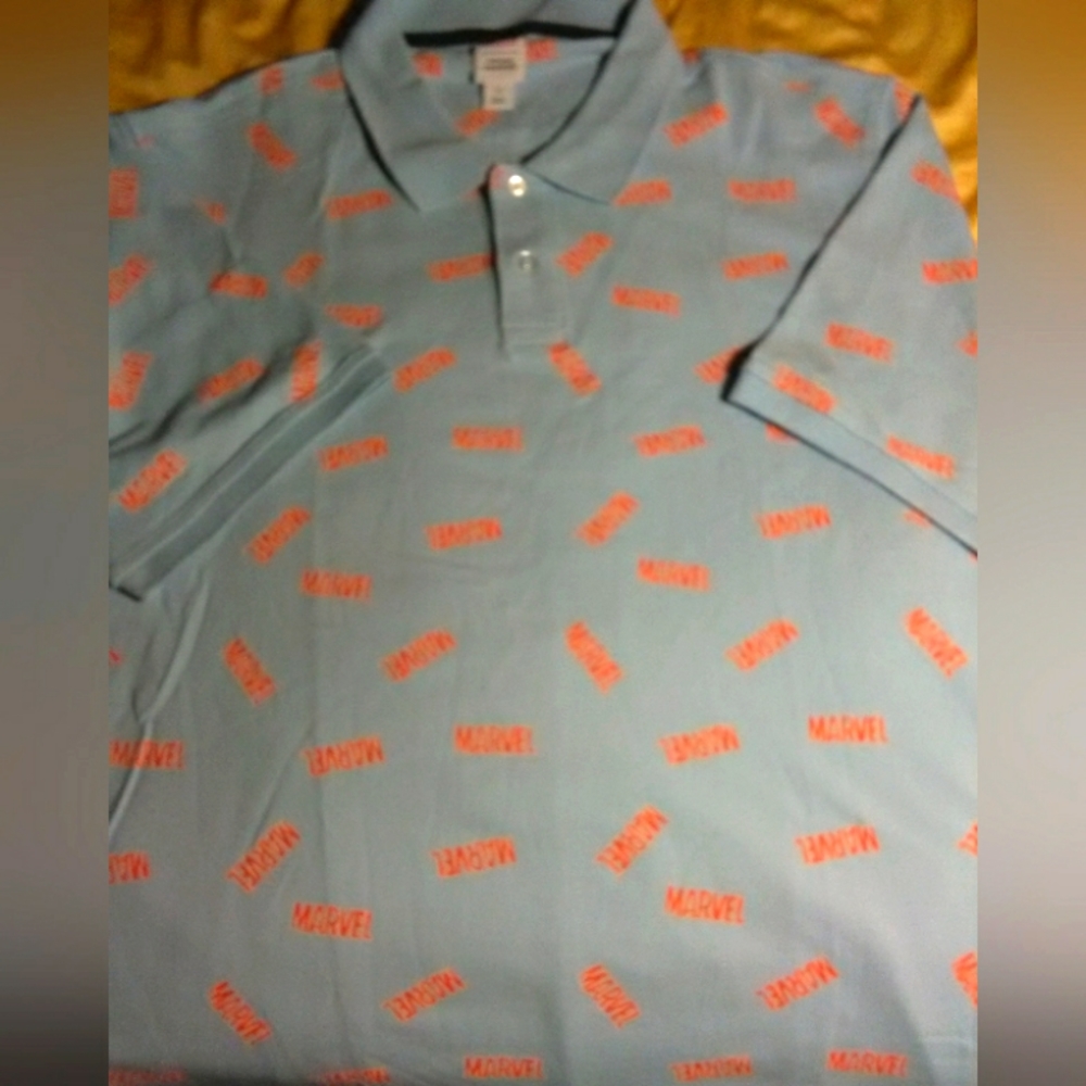 BNWOT MENS MARVEL POLO SHIRT SZ.XL BLUE W/ MARVEL ALL OVER IT BEAUTIFUL!